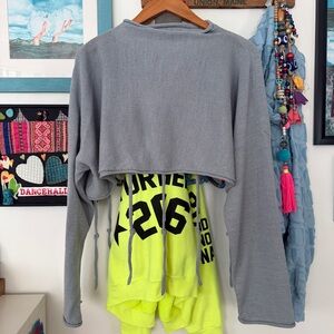 Blue grey cropped sweater with raw edge and stringy ottolinger type detailing